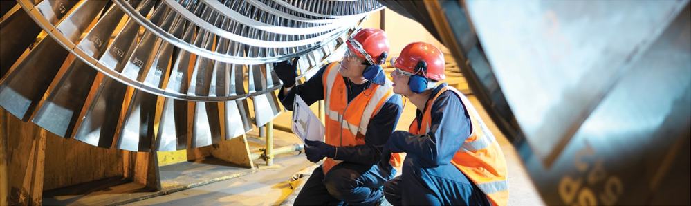 engineers working on turbine screen xl